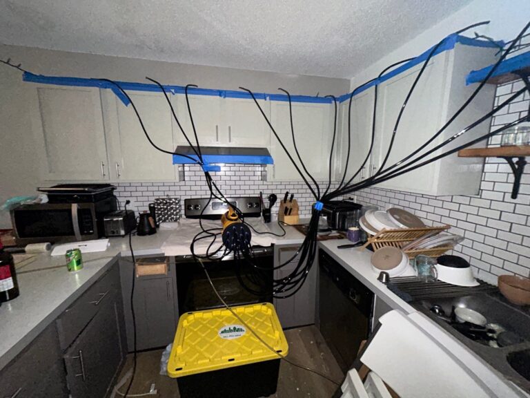 Drying equipment set up in a kitchen during water damage restoration