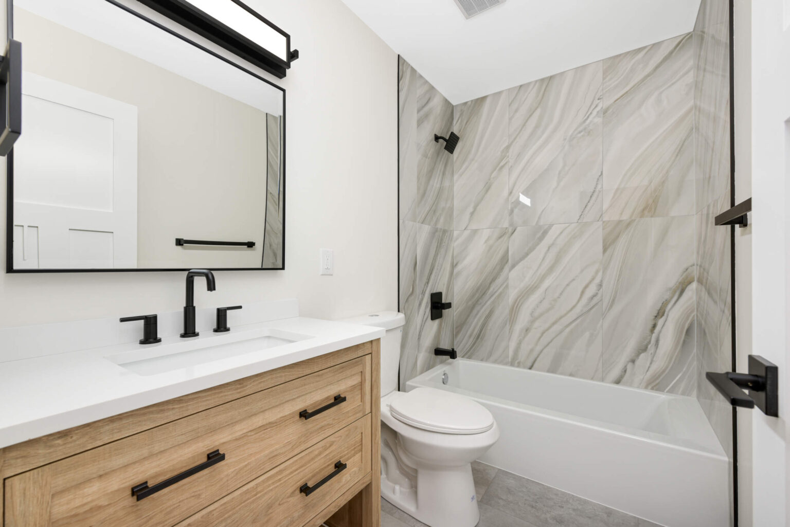 Bathroom remodel with tile tub surround